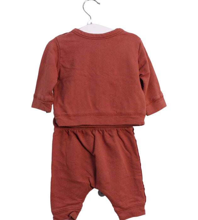 A Red Pants Sets from Nordstrom in size 0-3M for girl. (Back View)