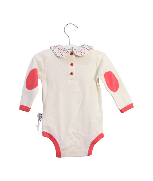 A Ivory Long Sleeve Bodysuits from TinyBitz in size 3-6M for girl. (Back View)
