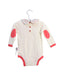 A Ivory Long Sleeve Bodysuits from TinyBitz in size 3-6M for girl. (Back View)
