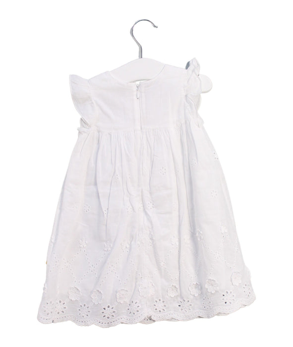 A White Short Sleeve Dresses from Steiff in size 6-12M for girl. (Back View)
