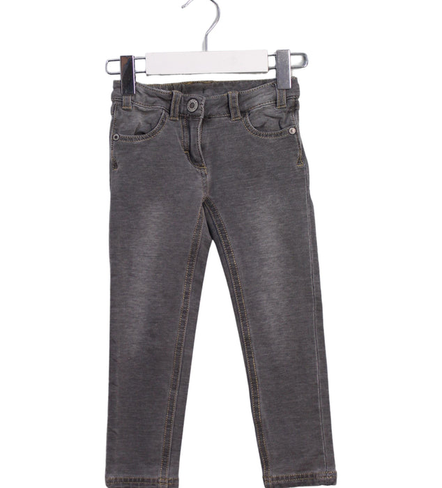 A Grey Jeans from Steiff in size 3T for girl. (Front View)