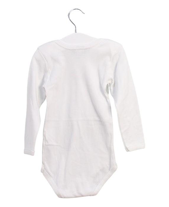 A White Long Sleeve Bodysuits from Petit Bateau in size 3T for girl. (Back View)