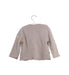 A Taupe Cardigans from Steiff in size 6-12M for girl. (Back View)