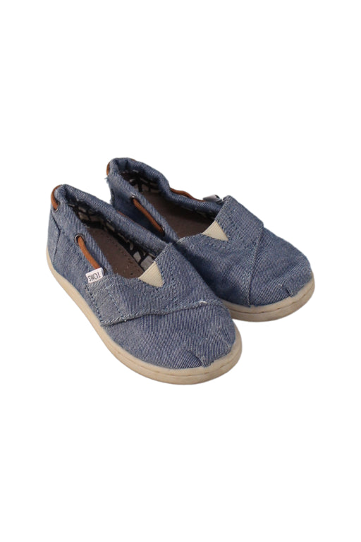 A Blue Slip Ons from Toms in size 3T for neutral. (Front View)