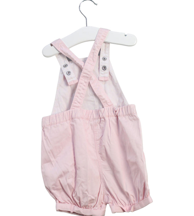 A Pink Overall Shorts from Petit Bateau in size 3T for girl. (Back View)