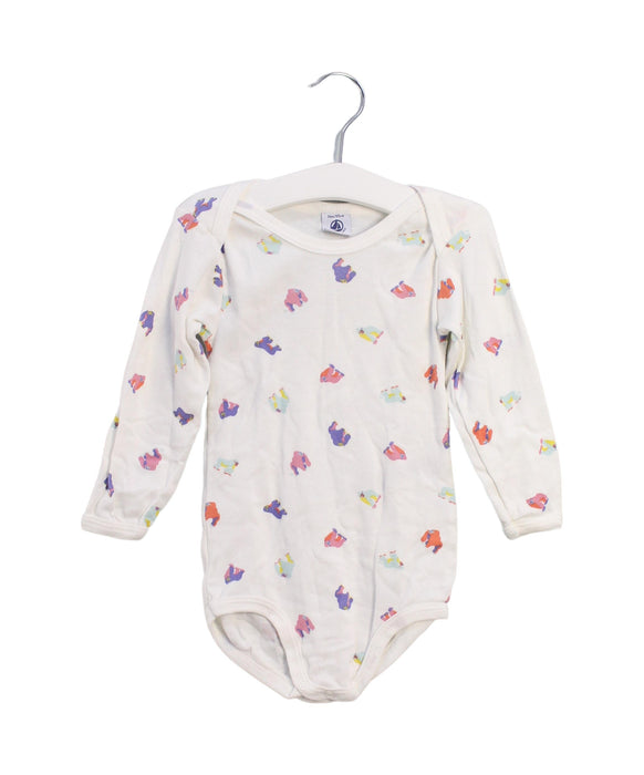 A White Long Sleeve Bodysuits from Petit Bateau in size 3T for girl. (Front View)