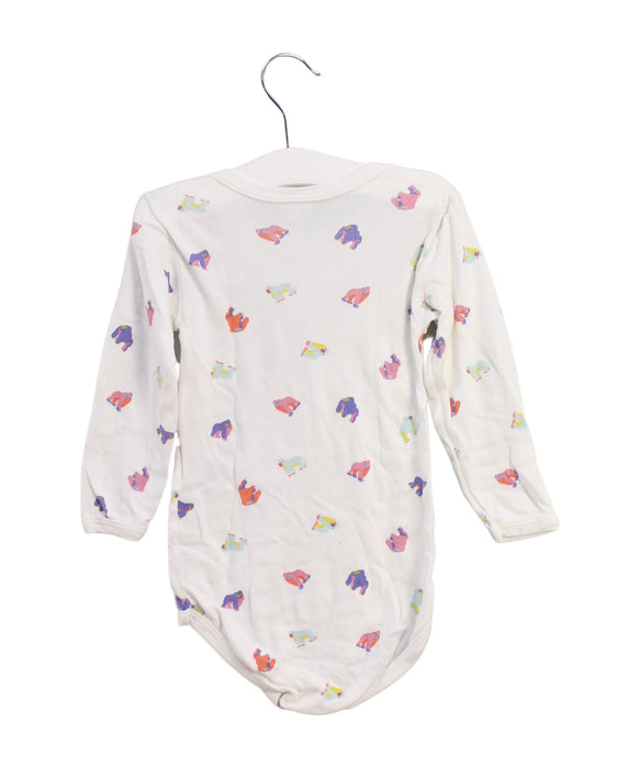 A White Long Sleeve Bodysuits from Petit Bateau in size 3T for girl. (Back View)