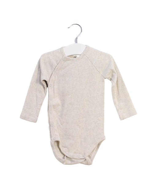 A Beige Long Sleeve Bodysuits from Petit Bateau in size 6-12M for neutral. (Front View)