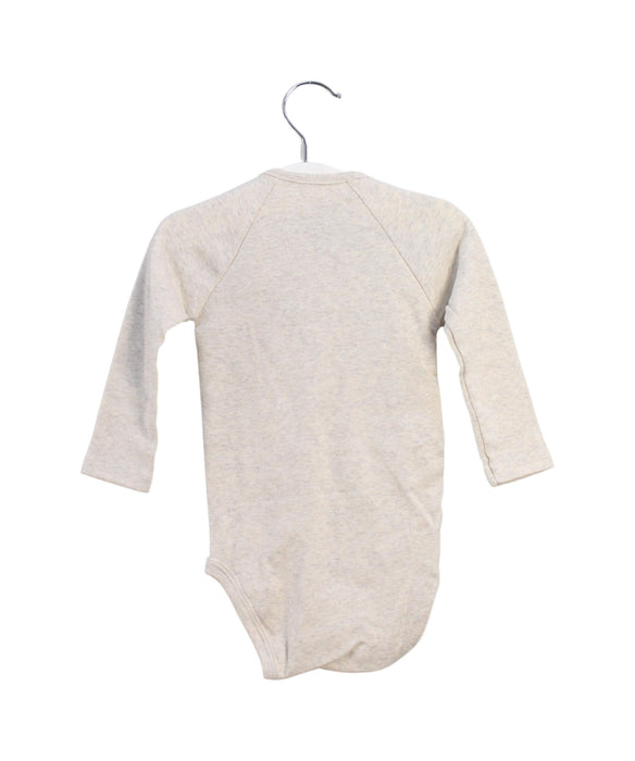 A Beige Long Sleeve Bodysuits from Petit Bateau in size 6-12M for neutral. (Back View)