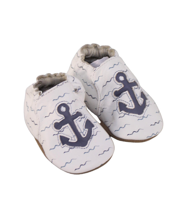 A White Booties from Robeez in size 0-3M for neutral. (Front View)