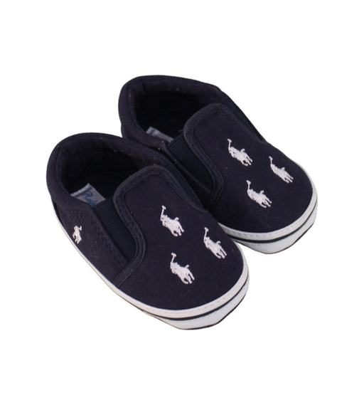 A Navy Slip Ons from Ralph Lauren in size 12-18M for neutral. (Front View)