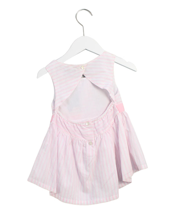 A Pink Sleeveless Dresses from Periwinkle in size 4T for girl. (Back View)