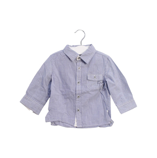 A Blue Shirts from Noukie's in size 6-12M for boy. (Front View)
