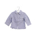 A Blue Shirts from Noukie's in size 6-12M for boy. (Front View)