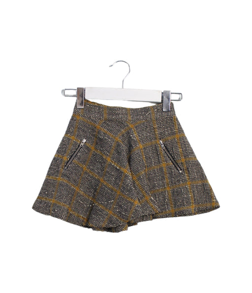 A Brown Short Skirts from Bonpoint in size 4T for girl. (Front View)