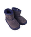 A Purple Winter Boots from Molo in size 5T for girl. (Front View)