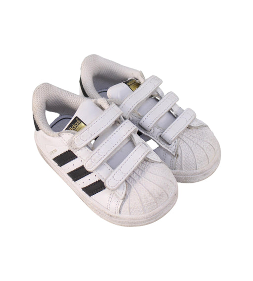 A White Sneakers from Adidas in size 12-18M for boy. (Front View)