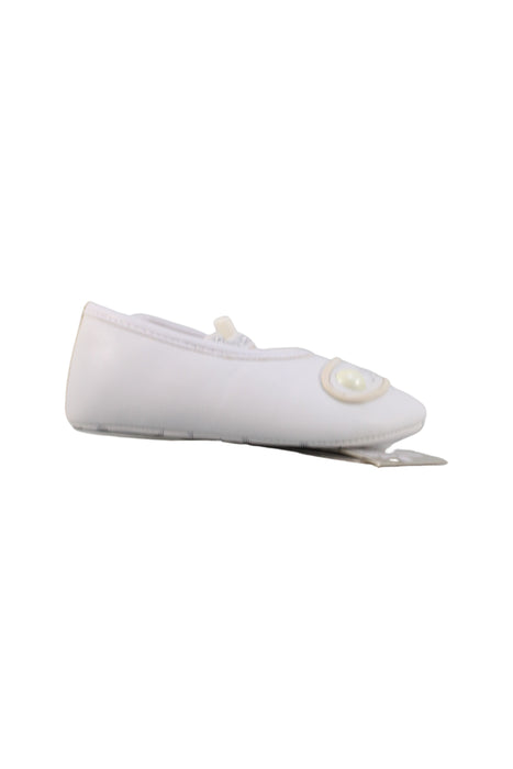 A White Flats from Armani in size 12-18M for girl. (Back View)