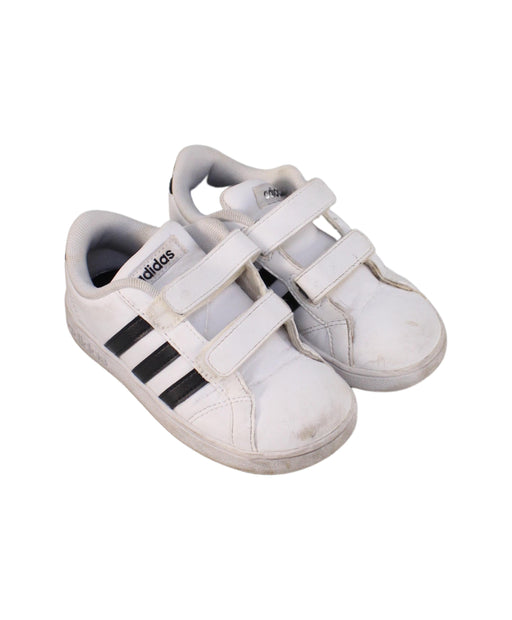 A White Sneakers from Adidas in size 4T for boy. (Front View)