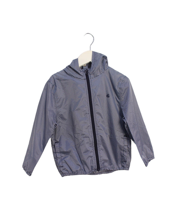 A Blue Rain Jackets from Petit Bateau in size 4T for girl. (Front View)