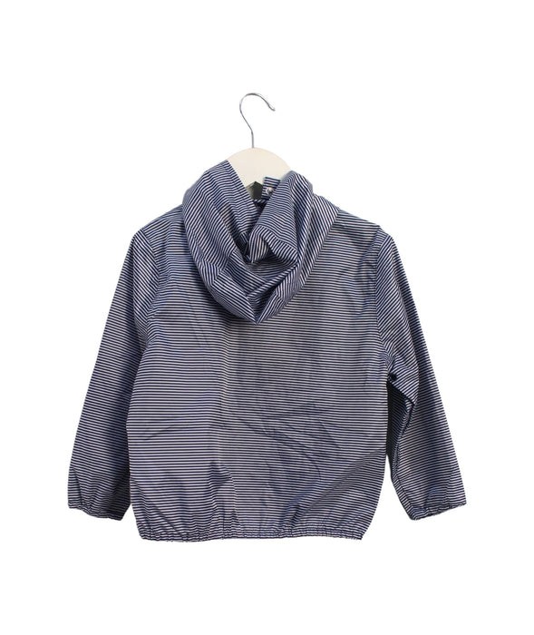 A Blue Rain Jackets from Petit Bateau in size 4T for girl. (Back View)