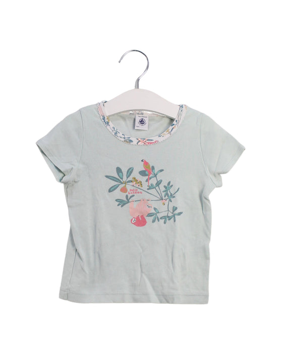 A Blue Pyjama Sets from Petit Bateau in size 4T for girl. (Front View)