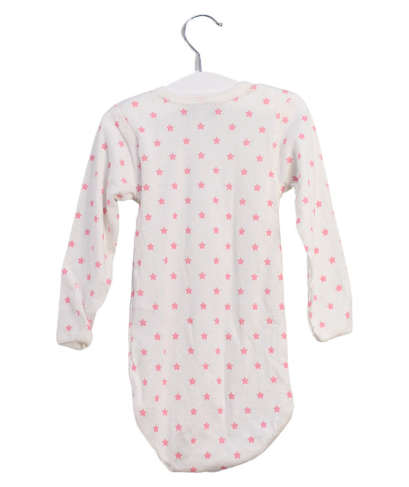A Pink Long Sleeve Bodysuits from Petit Bateau in size 2T for girl. (Back View)