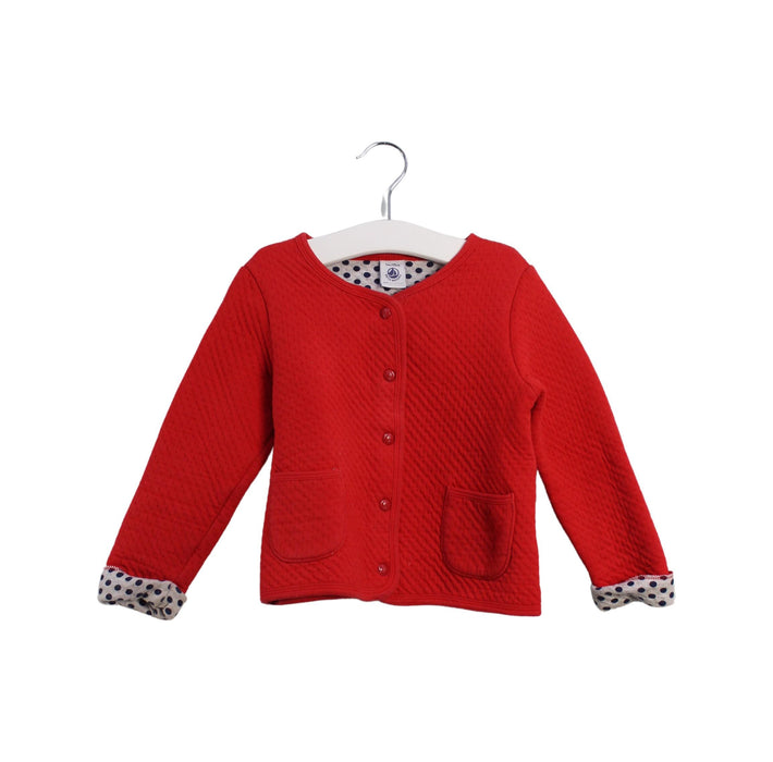 A Red Cardigans from Petit Bateau in size 3T for girl. (Front View)