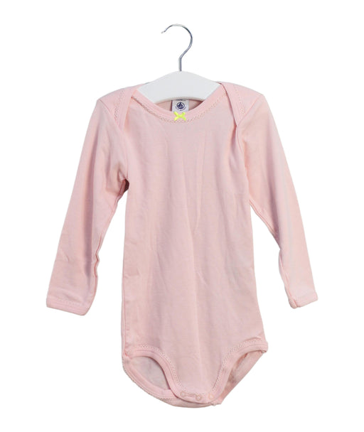 A Pink Long Sleeve Bodysuits from Petit Bateau in size 2T for girl. (Front View)
