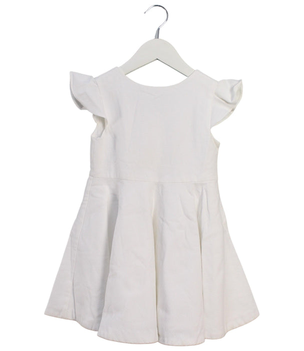 A White Short Sleeve Dresses from Jacadi in size 4T for girl. (Front View)