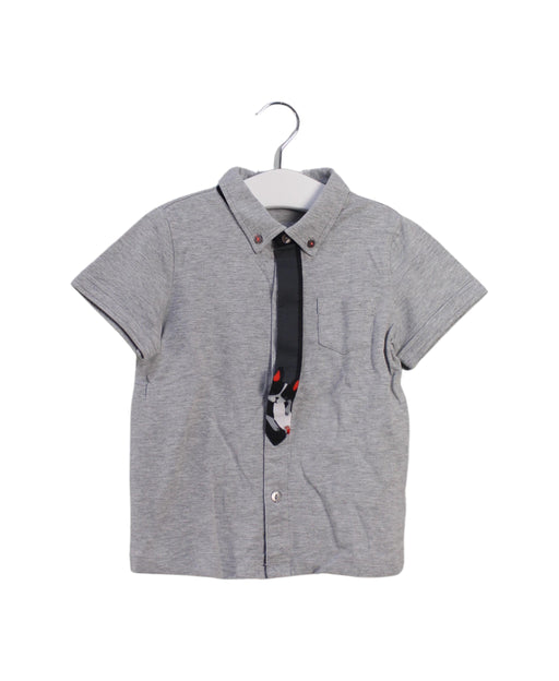A Grey Sleeveless Polos from Momonittu in size 4T for boy. (Front View)