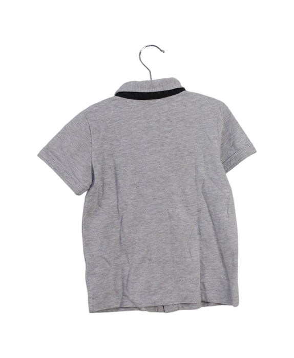 A Grey Sleeveless Polos from Momonittu in size 4T for boy. (Back View)