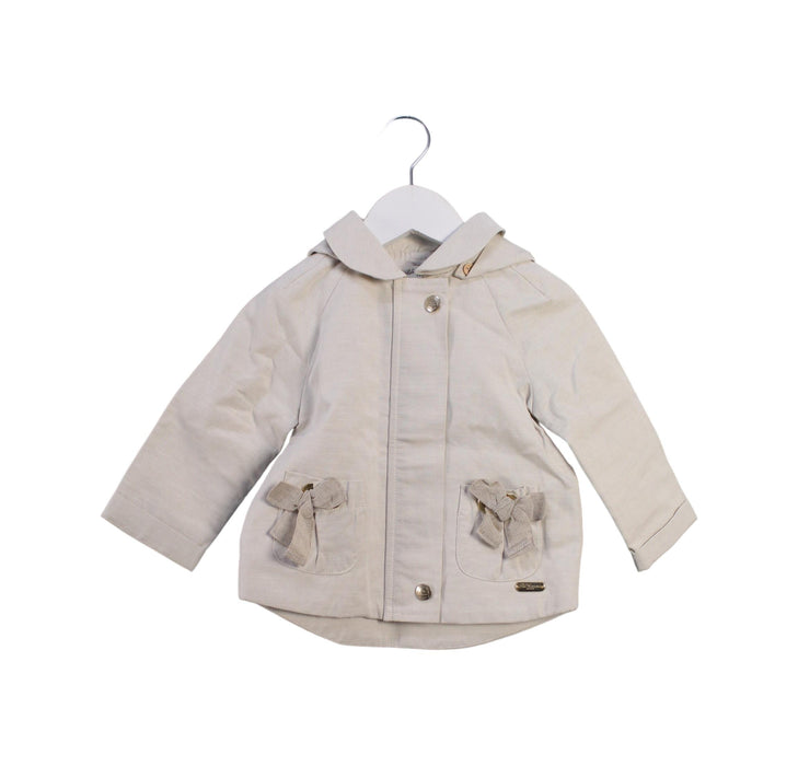 A Beige Lightweight Jackets from Pili Carrera in size 6-12M for girl. (Front View)