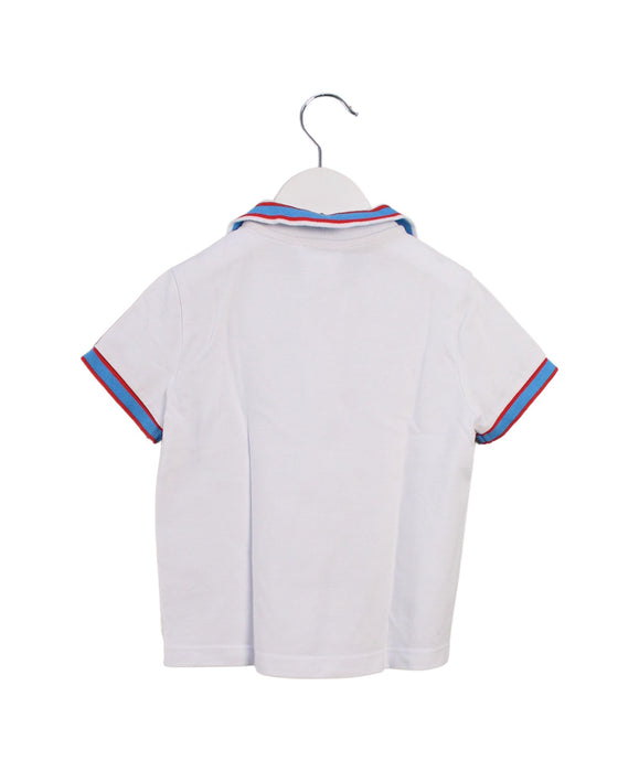 A White Short Sleeve Polos from Jacadi in size 4T for boy. (Back View)