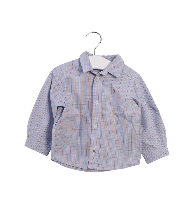 A Blue Shirts from Jacadi in size 6-12M for boy. (Front View)