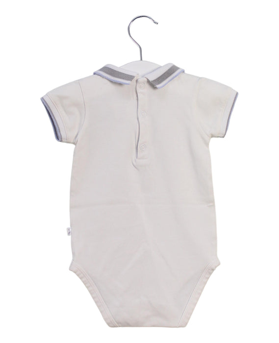 A White Short Sleeve Bodysuits from Jacadi in size 6-12M for boy. (Back View)