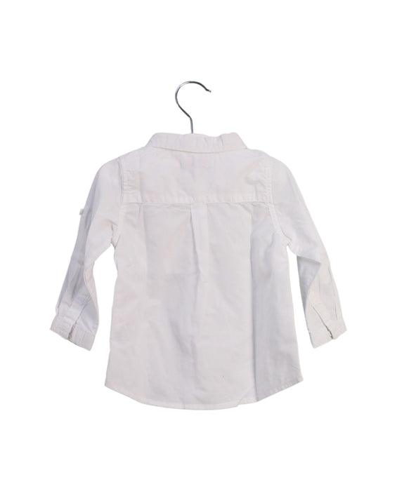 A White Shirts from DPAM in size 6-12M for boy. (Back View)