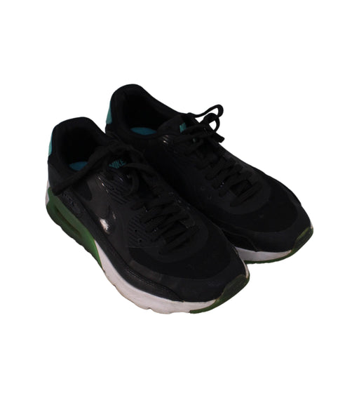 A Black Sneakers from Nike in size 4T for boy. (Front View)