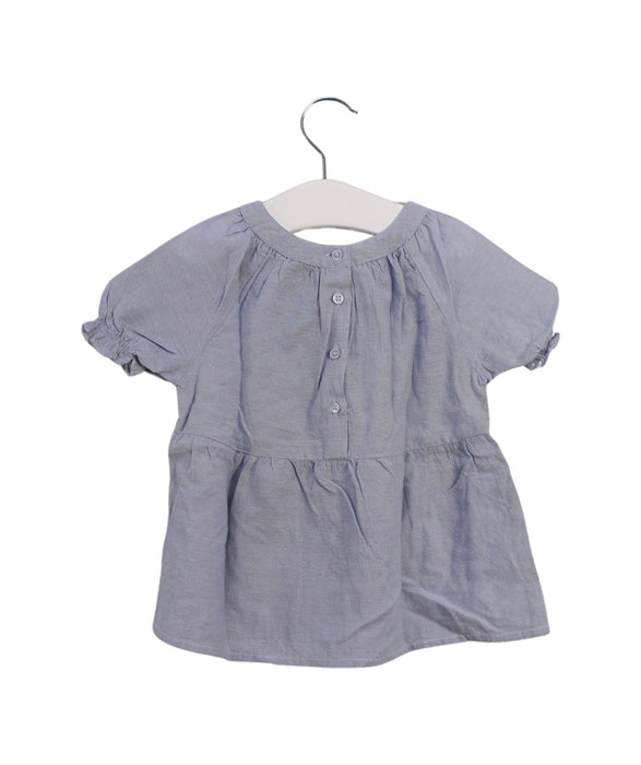 A Blue Short Sleeve Tops from Velveteen in size 3T for girl. (Back View)