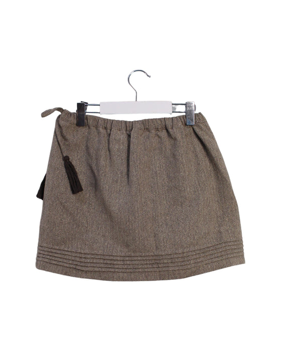 A Taupe Short Skirts from CdeC in size 6T for girl. (Back View)