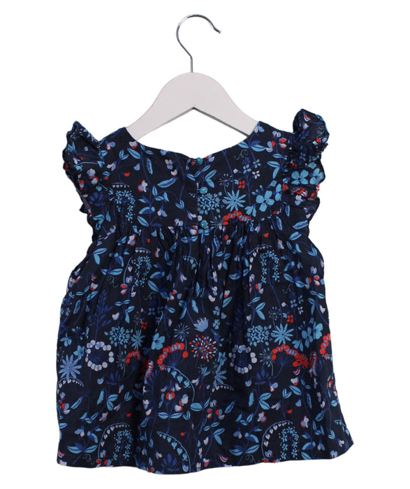 A Blue Sleeveless Tops from Jacadi in size 6T for girl. (Back View)