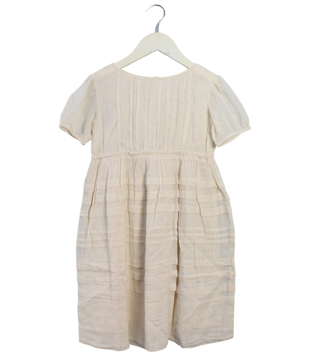 A Ivory Short Sleeve Dresses from Bonpoint in size 6T for girl. (Front View)