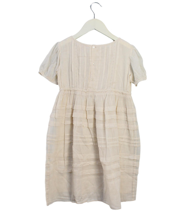 A Ivory Short Sleeve Dresses from Bonpoint in size 6T for girl. (Back View)