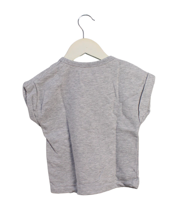 A Grey Short Sleeve Tops from Seed in size 2T for girl. (Back View)