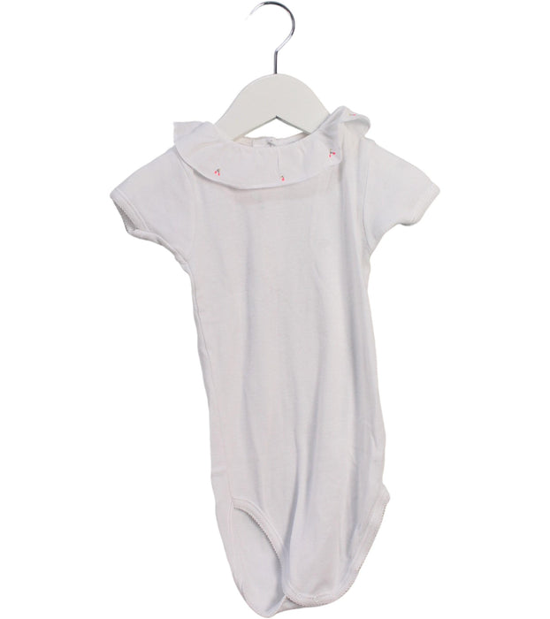 A White Short Sleeve Bodysuits from Bonpoint in size 2T for girl. (Front View)