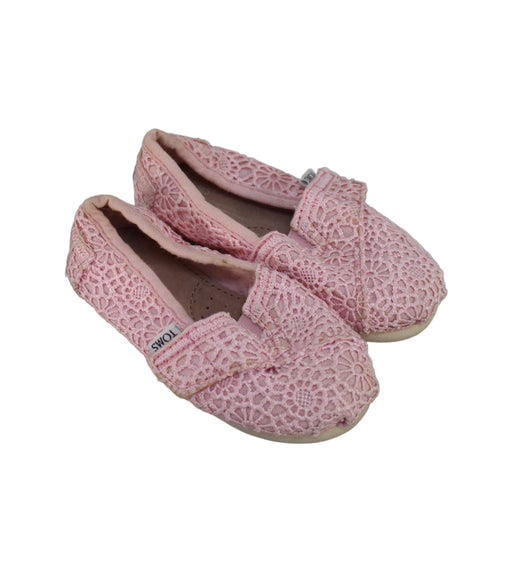 A Pink Slip Ons from Toms in size 18-24M for girl. (Front View)