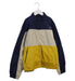 A Yellow Lightweight Jackets from Bellerose in size 10Y for boy. (Front View)