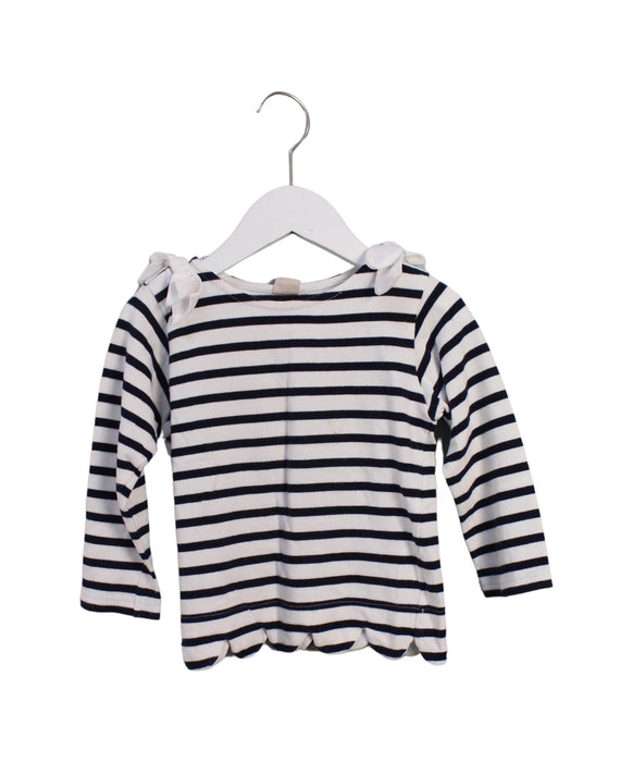 A Navy Long Sleeve Tops from Petit Main in size 4T for girl. (Front View)