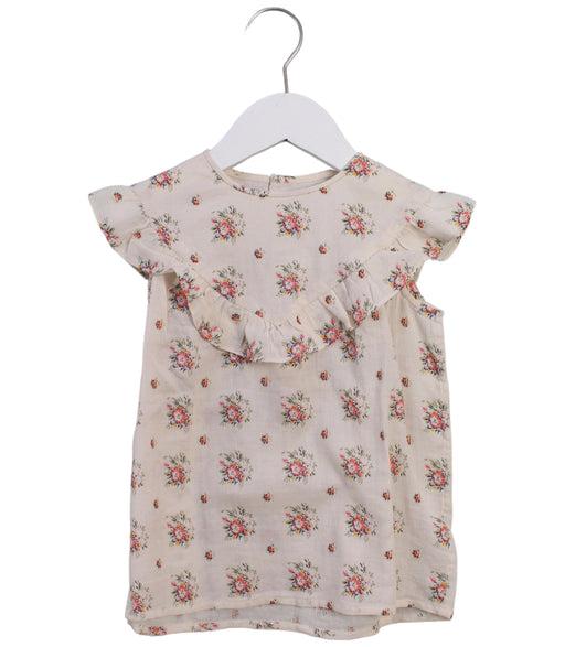 A Ivory Short Sleeve Tops from Bonpoint in size 4T for girl. (Front View)