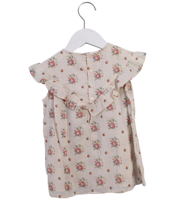 A Ivory Short Sleeve Tops from Bonpoint in size 4T for girl. (Back View)